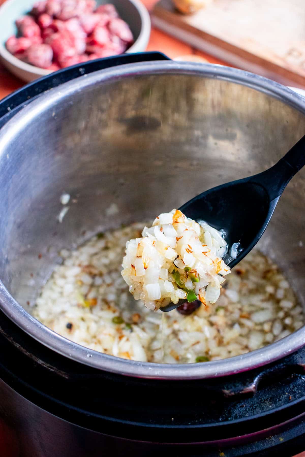onions cooking in instant pot for biryani