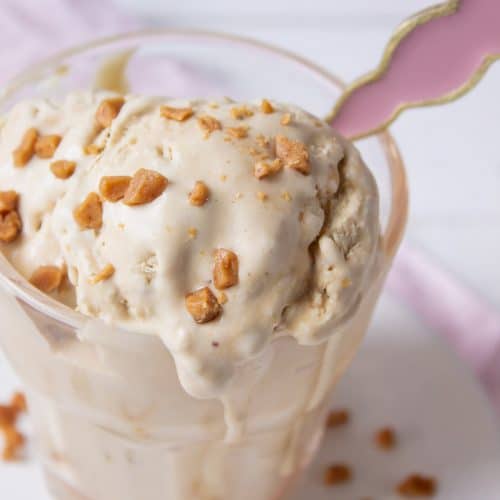 A cup of no churn coffee toffee ice cream with toffee bits