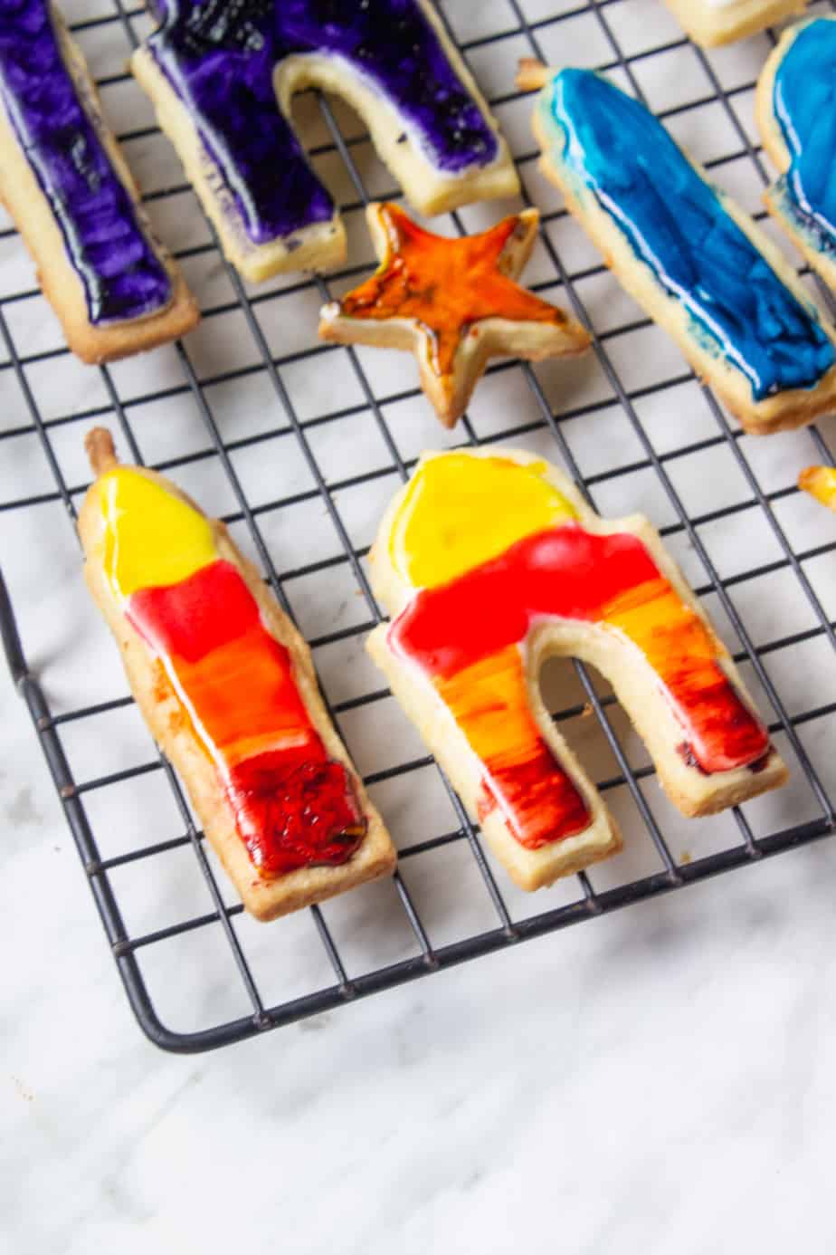 Painted Eid cookies - one full set of a mosque, a star and two partial mosques.