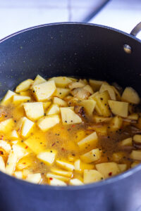potatoes and water added to the aloo poori pot