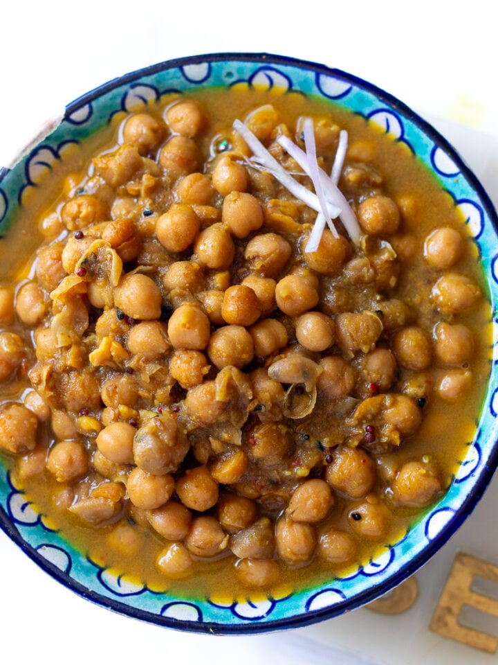top down view of a plate of poori chana or puri chole