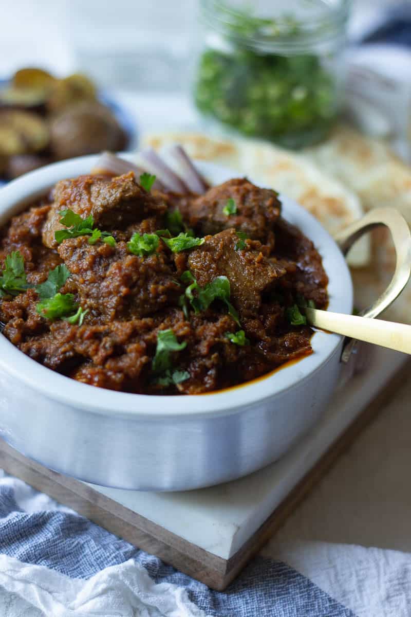 tamatar gosht in a dish