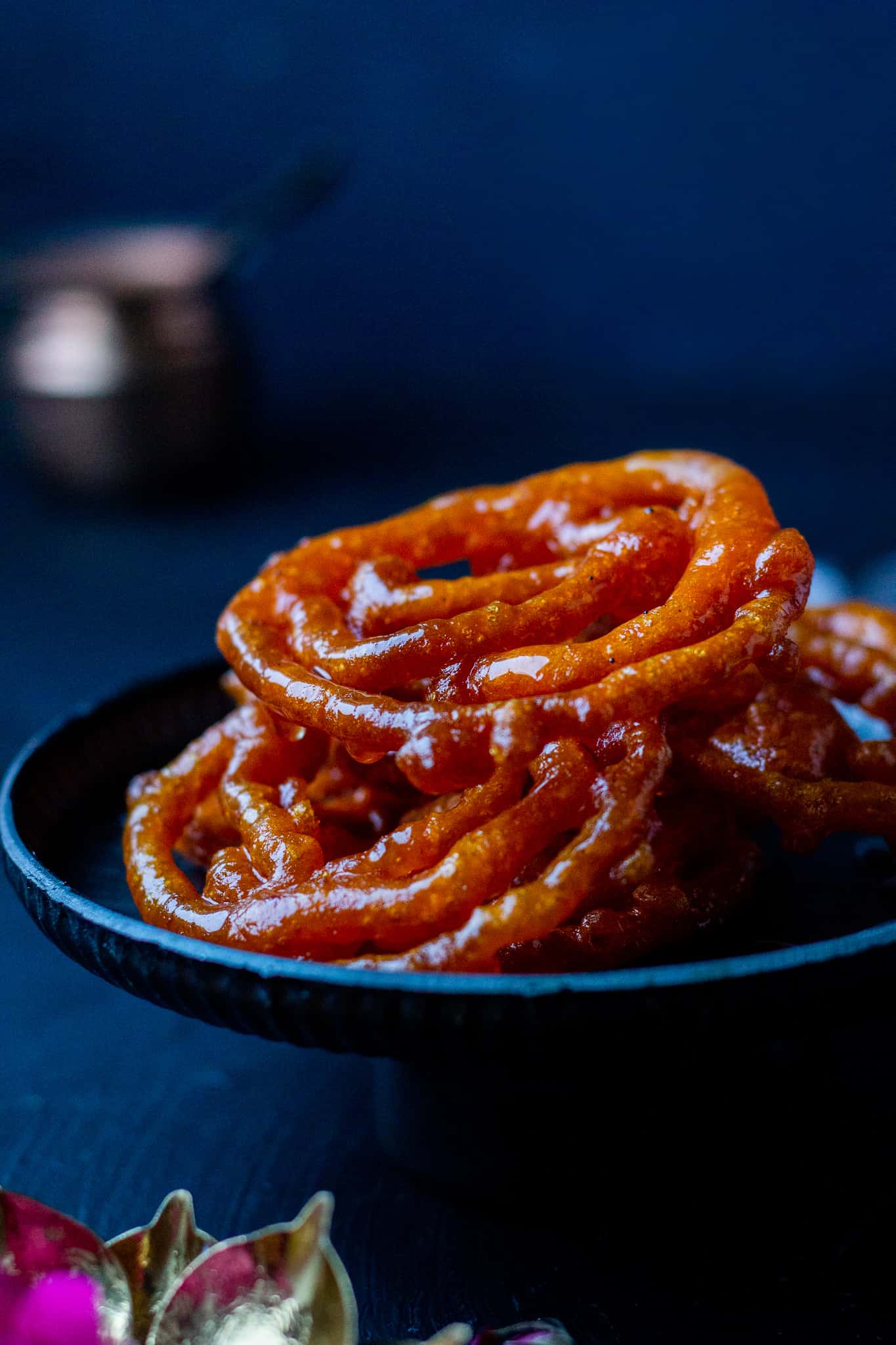 a few Jalebis on a plate