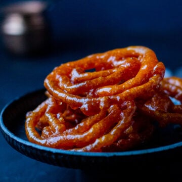 Jalebis stacked in a bowl
