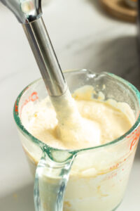 besan and yogurt being pureed together