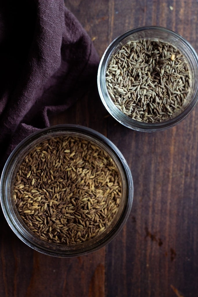 top down view of two jars of zeera or cumin seeds
