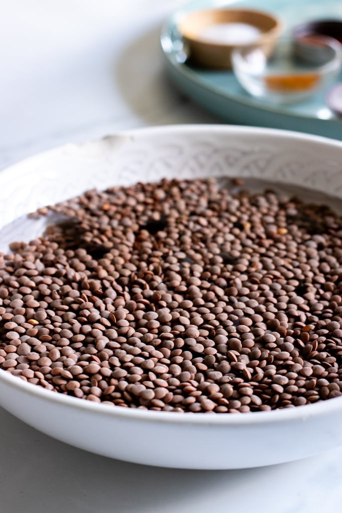 a bowl of uncooked sabut masoor