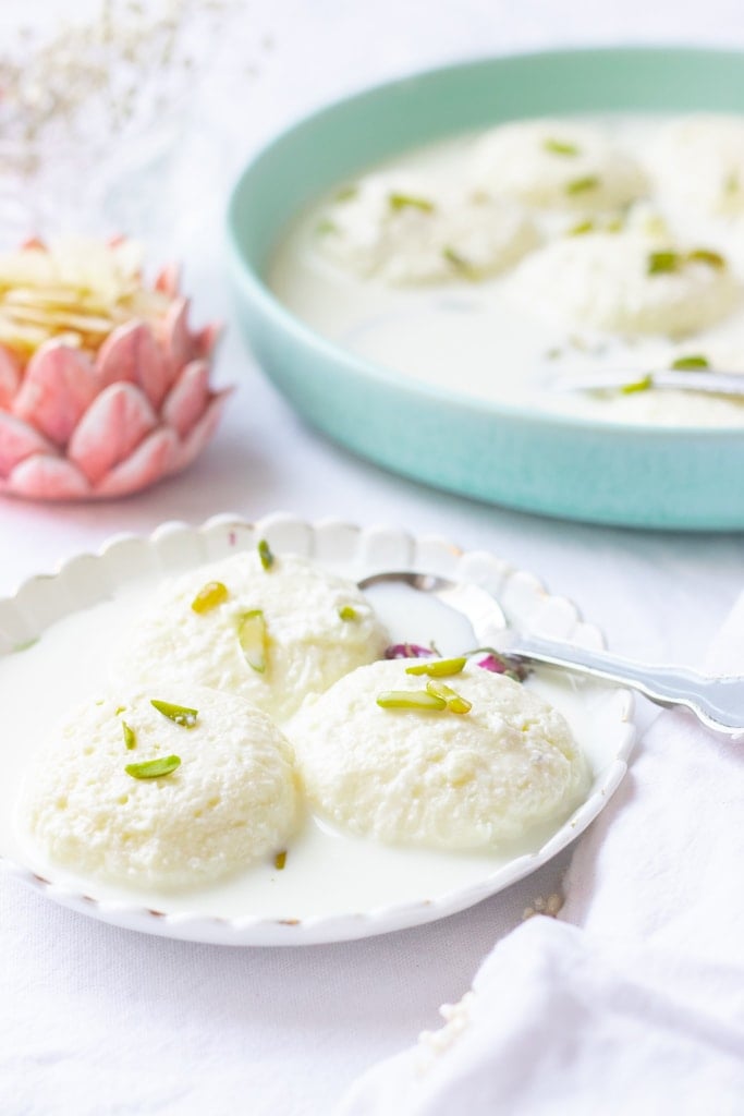 milk powder ras malai in foreground and background in different dishes