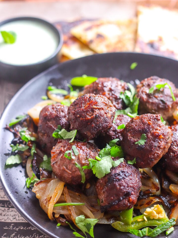 3/4 view of a plate of Gola Kabab