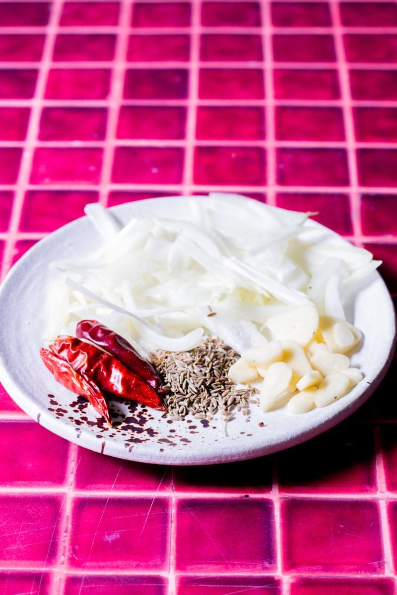baghaar for daal: red chilies, sliced onion and garlic, cumin seeds