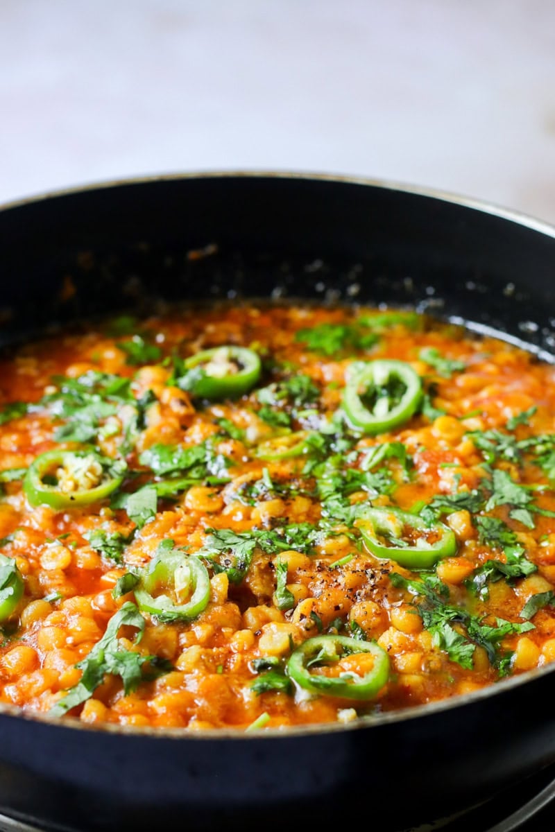 dhaba style chana dal fry or dal tadka in a pot