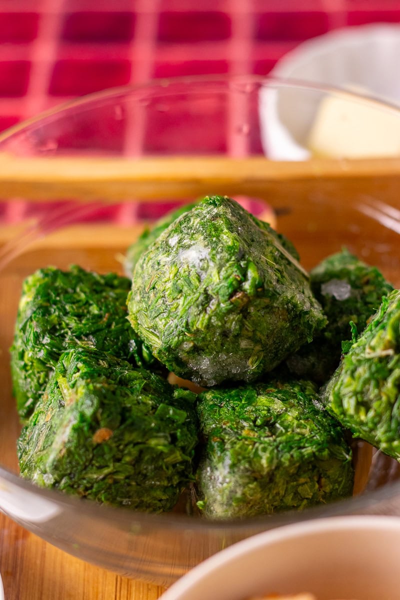 frozen indian spinach cubes in a bowl