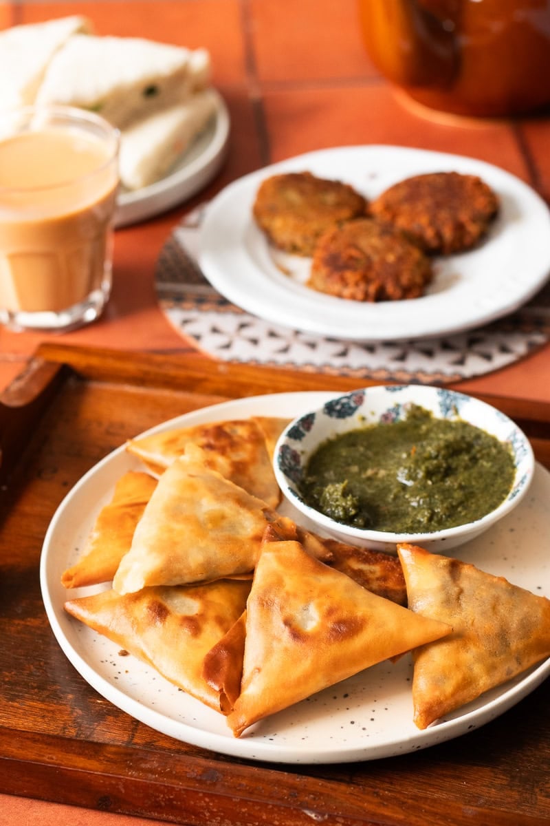 a plate of fried samosas