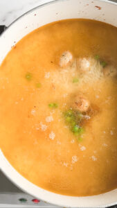 covered pot with moti pulao ingredients inside